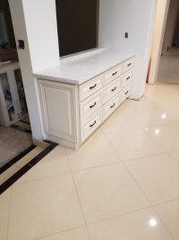 White cabinet with white counter top